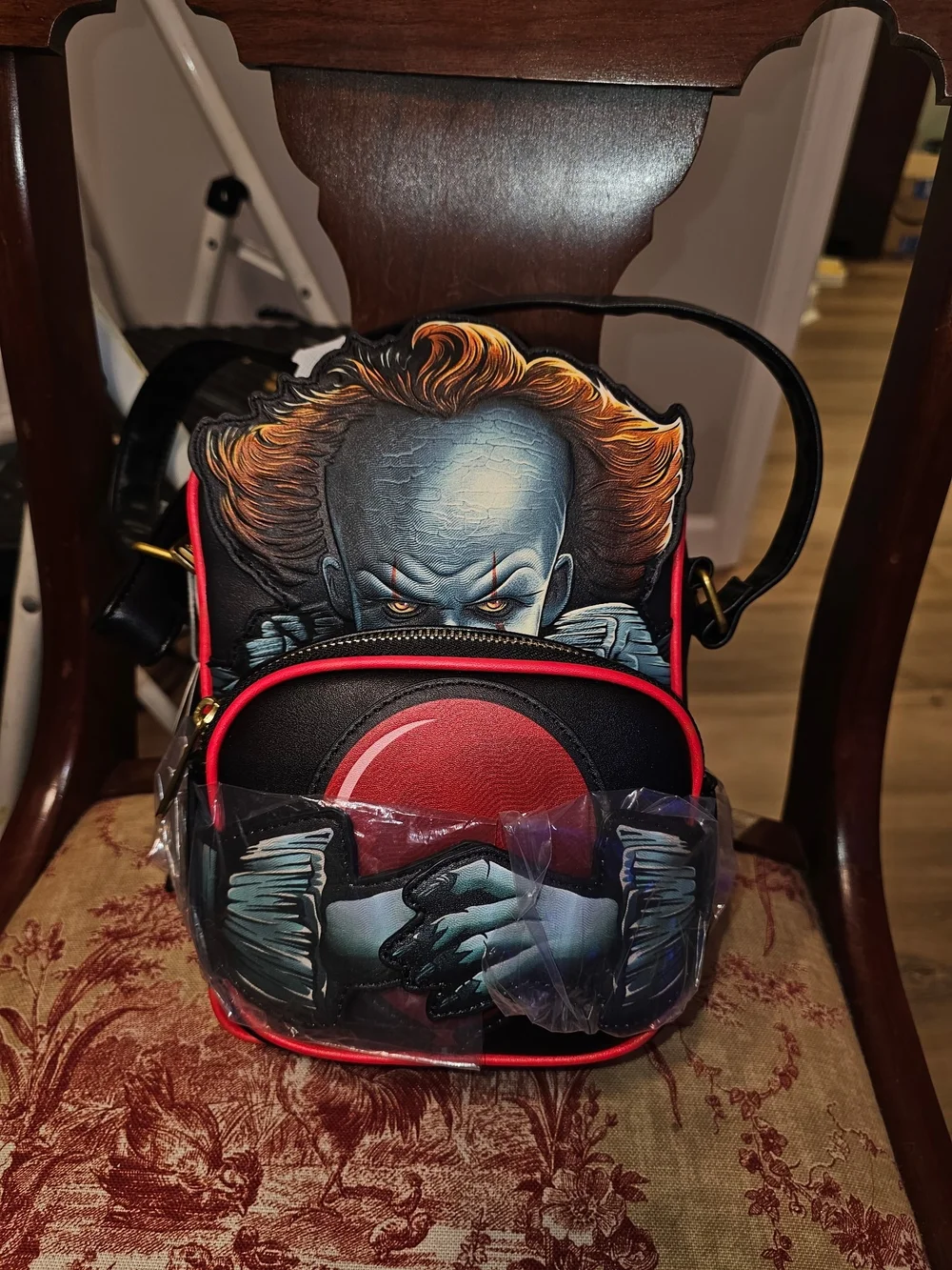Pennywise bag is a Crossbuddies Cosplay Crossbody Loungefly